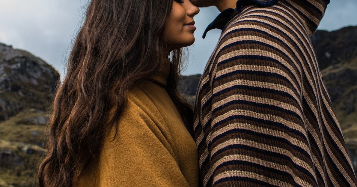 Happy couple celebrating their engagement with heartfelt congratulations messages.